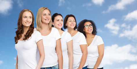 Image showing group of happy different women in white t-shirts