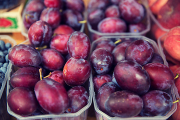 Image showing close up of satsuma plums at street market