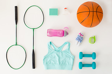 Image showing close up of badminton rackets with sports stuff