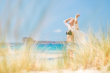 Image showing Free Happy Woman Enjoying Sun on Vacations.