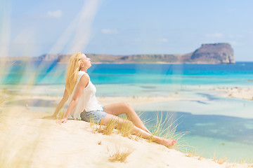 Image showing Relaxed Happy Woman Enjoying Sun on Vacations.