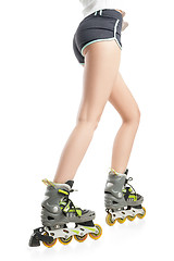 Image showing Close up  picture of woman\'s legs with rollerskates 