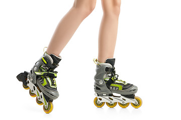 Image showing Close up  picture of woman\'s legs with rollerskates 