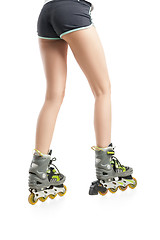 Image showing Close up  picture of woman\'s legs with rollerskates 