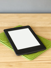 Image showing ebook reader on a wooden table