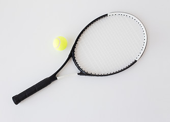 Image showing close up of tennis racket with ball