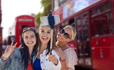 Image showing group of smiling women taking selfie in london