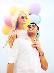 Image showing couple with colorful balloons