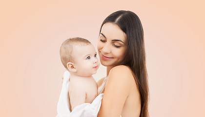 Image showing happy mother holding adorable baby