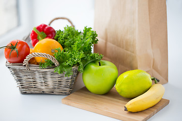 Image showing basket of fresh friuts and vegetables at kitchen
