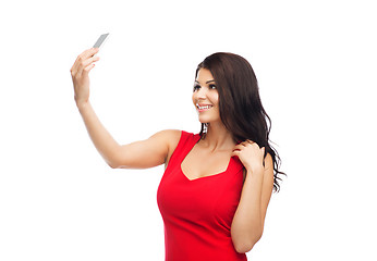 Image showing sexy woman taking selfie picture by smartphone