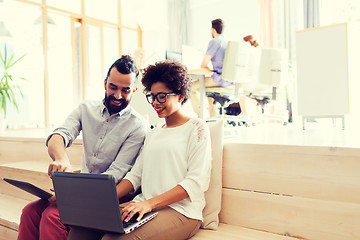 Image showing creative team with laptop and tablet pc at office