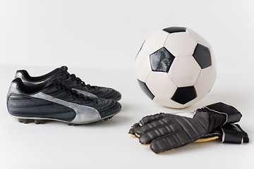 Image showing close up of goalkeeper gloves, ball, soccer boots