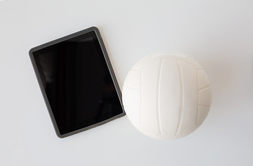 Image showing close up of volleyball ball and tablet pc computer