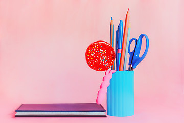 Image showing Candy with pink and blue stationery set and notepad