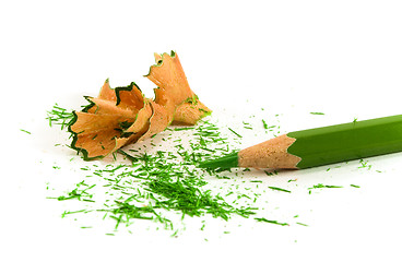 Image showing green pencil and sawdust
