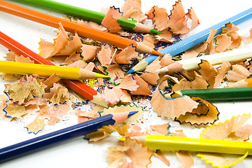 Image showing coloured pencils and sawdust