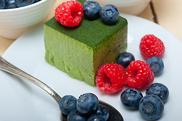 Image showing green tea matcha mousse cake with berries