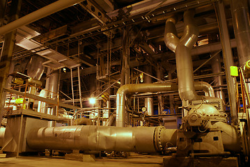 Image showing Equipment, cables and piping as found inside of a modern industr