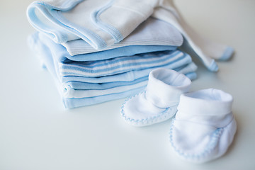 Image showing close up of baby boys clothes for newborn on table