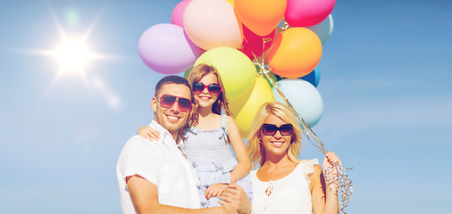 Image showing family with colorful balloons