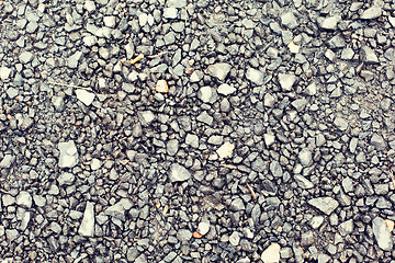 Image showing close up of gray macadam stones on ground