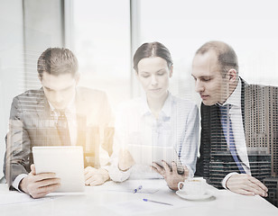 Image showing business team with tablet pc having discussion