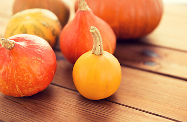 Image showing close up of pumpkins on wooden table at home