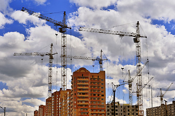 Image showing  Construction site with cranes on sky background