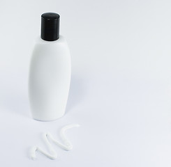 Image showing cream and white bottle