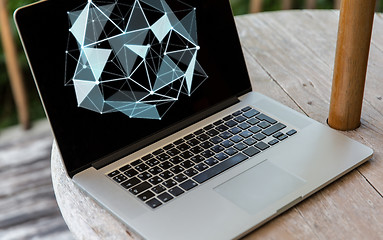 Image showing close up of laptop computer on table at hotel