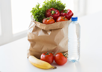 Image showing close up of bag with friuts, vegetables and water