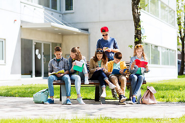 Image showing group of students with notebooks at school yard