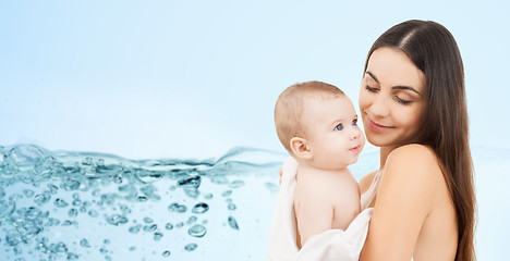 Image showing happy mother holding adorable baby