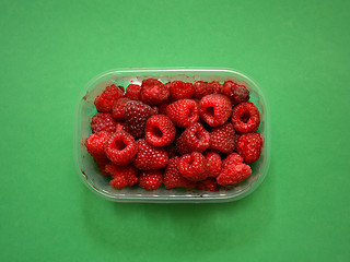 Image showing Fresh raspberries in plastic box