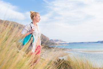 Image showing Free Happy Woman Enjoying Sun on Vacations.