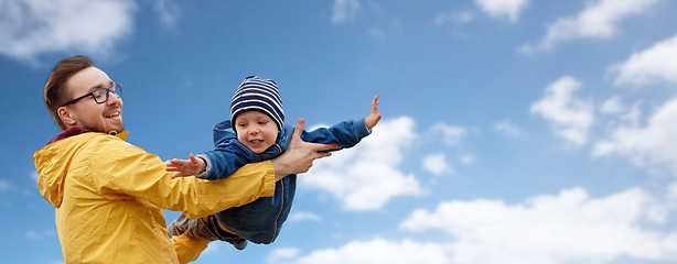 Image showing father with son playing and having fun outdoors