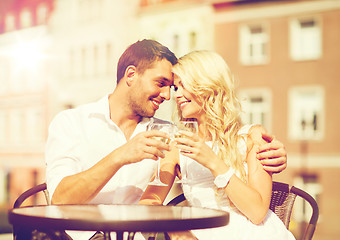 Image showing couple drinking wine in cafe