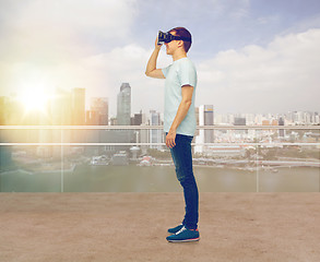 Image showing happy man in virtual reality headset or 3d glasses