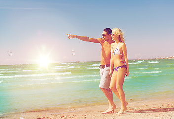 Image showing couple walking on the beach