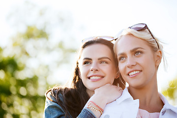 Image showing happy young women or teenage girls outdoors