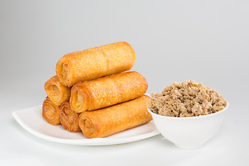 Image showing pancakes with meat on white plate