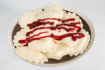 Image showing Homemade traditional Ukrainian dumplings, vareniki with cherries