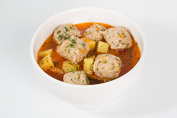 Image showing Meatballs with roast potatoes and vegetables.