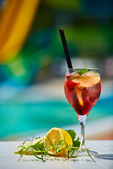 Image showing Tasty cocktail background swimming pool