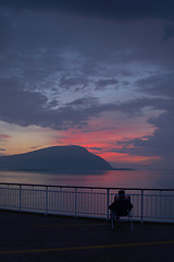 Image showing Tourist in sunset