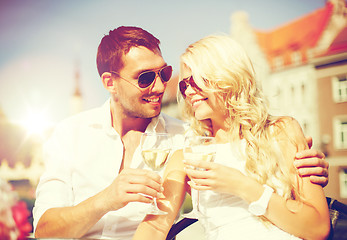 Image showing couple drinking wine in cafe