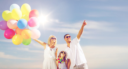 Image showing family with colorful balloons