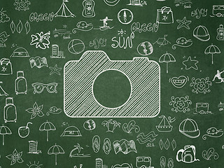 Image showing Vacation concept: Photo Camera on School board background