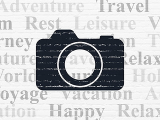 Image showing Vacation concept: Photo Camera on wall background
